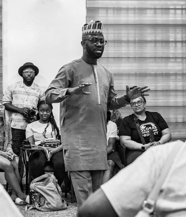 Mentor Rotimi Olawale speaking to youth